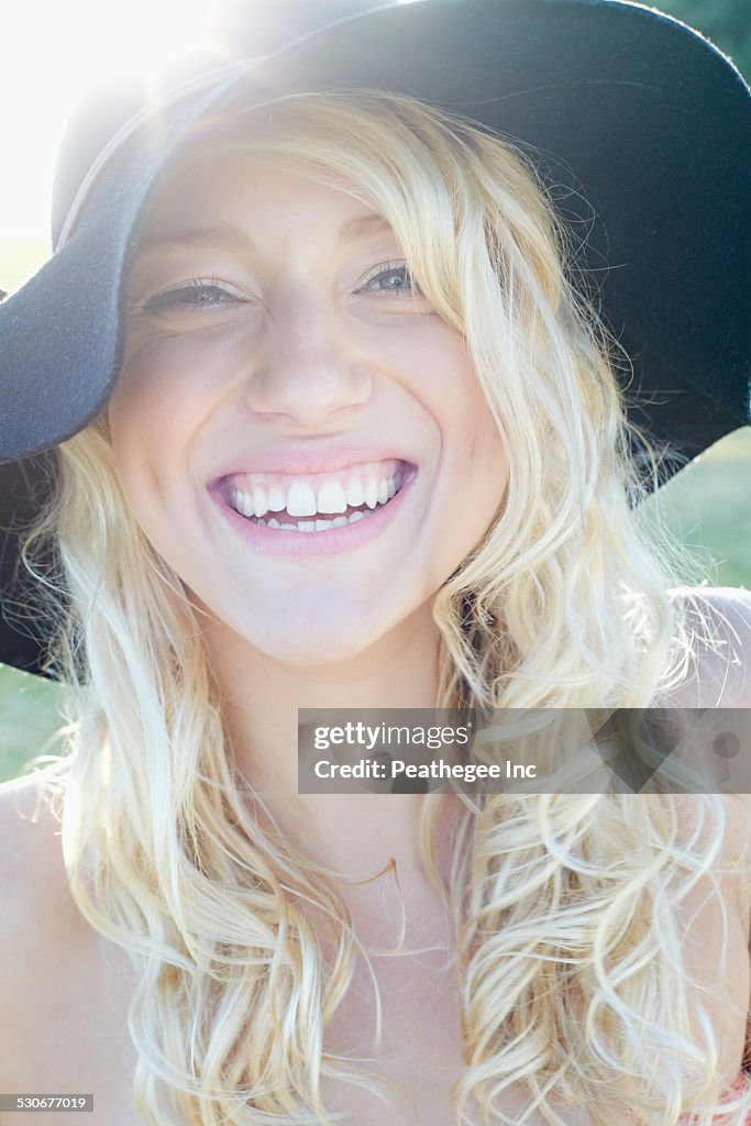 Caucasian woman wearing floppy hat