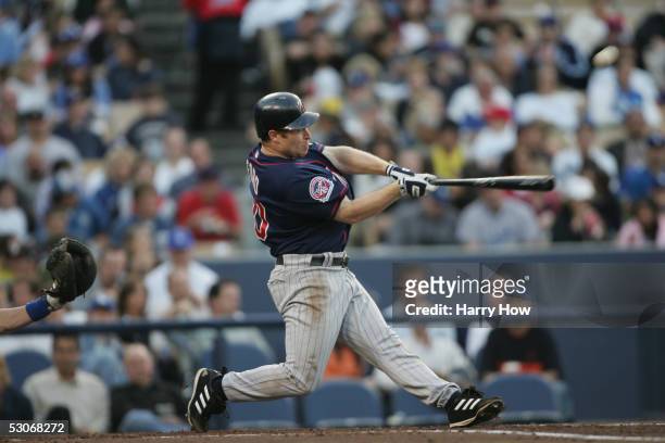 Outfielder Lew Ford of the Minnesota Twins swings at a Los Angeles Dodgers pitch during the game on June 11, 2005 at Dodger Stadium in Los Angeles,...