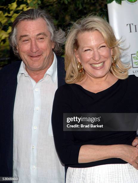 Robert De Niro and Bette Midler pose at Bette Midler's New York Restoration Project's 4th Annual Picnic at Spanish Harlem's Thomas Jefferson Park on...