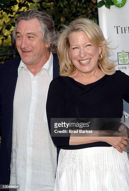 Robert De Niro and Bette Midler pose at Bette Midler's New York Restoration Project's 4th Annual Picnic at Spanish Harlem's Thomas Jefferson Park on...