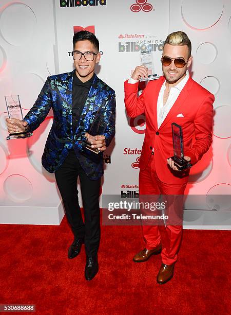 Backstage -- Pictured: Chino y Nacho backstage during the 2014 Billboard Latin Music Awards, from Miami, Florida at BankUnited Center, University of...