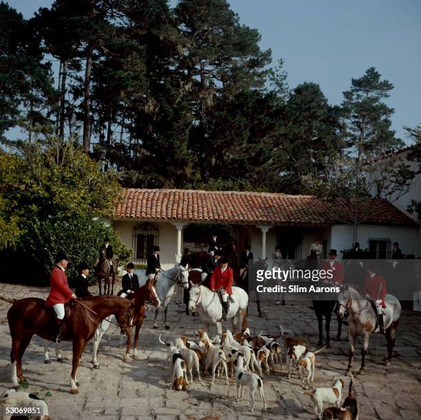 Riders gather in the courtyard of Richard Collins' House for the stirrup cup libation, before the start of the Pebble Beach Hunt of English and...
