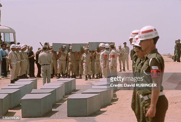 Coffins, containing the bodies of Israeli soldiers, are returned to Israeli after the Yom Kippur war.