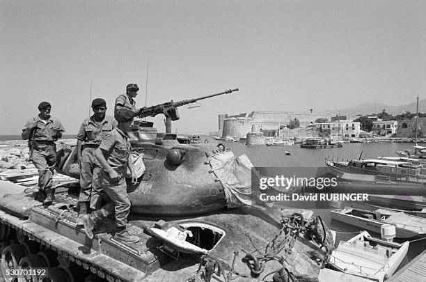 Turkish soldiers stand on a tank outside Farmagusta ten days after they launched their invasion of Cyprus. | Location: Farmagusta, Cyprus.