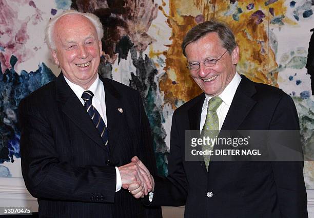 Austrian Chancelor Wolfgang Schuessel and Hungarian President Ferenc Madl shake hands prior to their meeting in Vienna 15 June 2005. Madl is on a...
