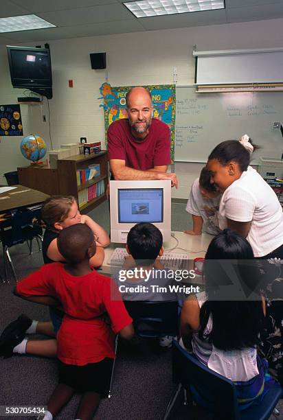 biologist teaching schoolchildren - vintage computer apple stock pictures, royalty-free photos & images