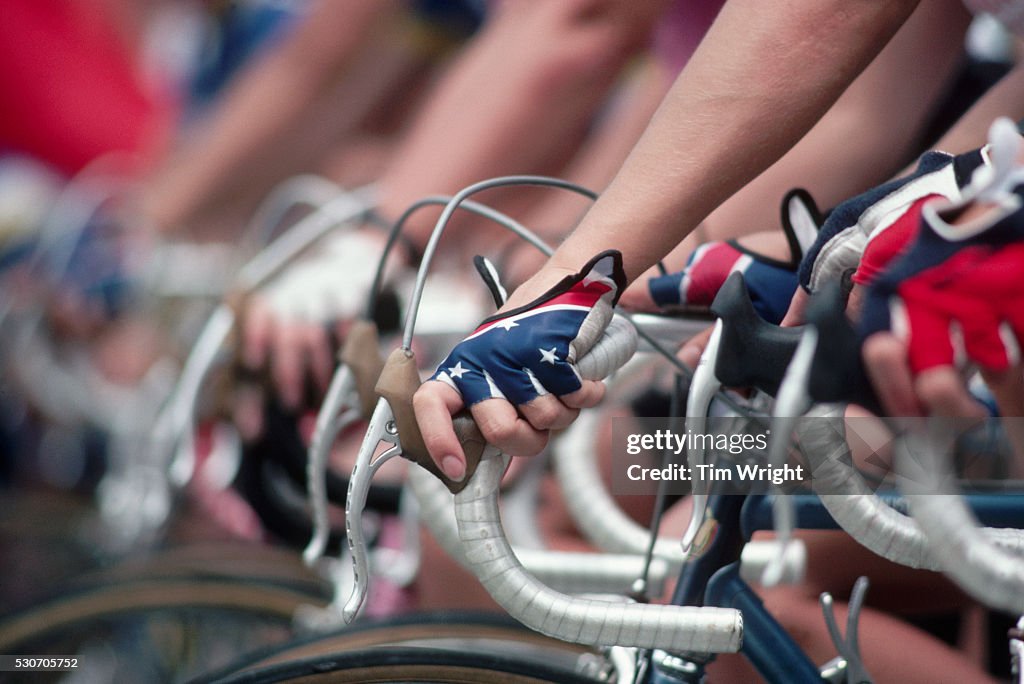 Bike Racer's Hands on Handlebars