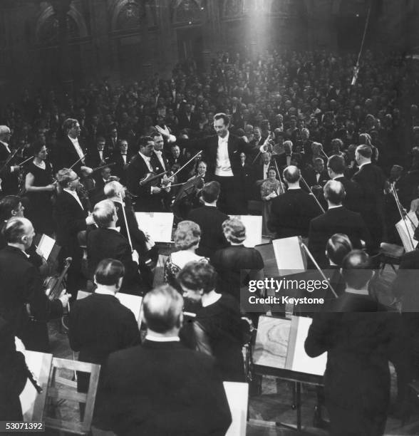 Italian conductor Carlo Maria Giulini conducts the New Philharmonia Orchestra at the Concertgebouw, Amsterdam, 30th November 1965. The concert...