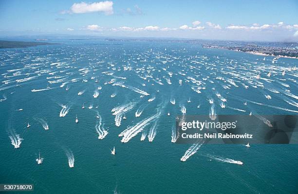 boats moving through auckland harbor - auckland harbour stock pictures, royalty-free photos & images