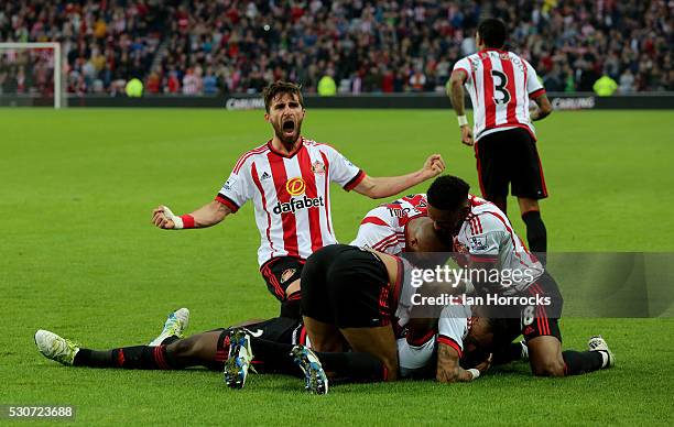 Sunderland players celebrate the second goal during the Barclays Premier League match between Sunderland and Everton at the Stadium of Light on May...