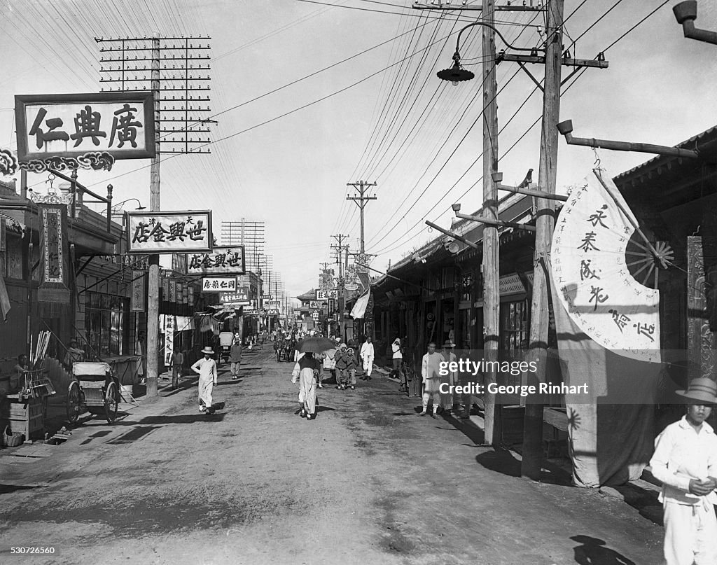 Chinese Street with Pedestrians & Signs