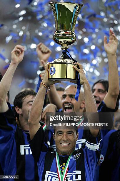 Inter-Milan's capitain Ivan Ramiro Cordoba lifts the Coppa Italia after winning the final football match against AS Roma in Milan's S.Siro Stadium 15...