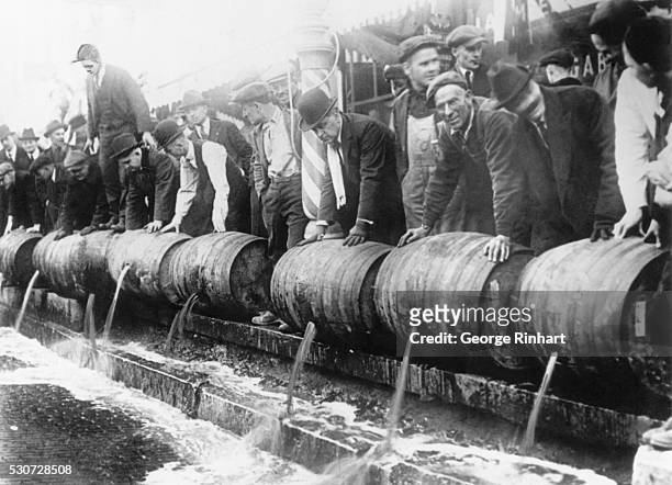 Barrels of beer emptied into the sewer by authorities during prohibition. Undated photograph. BPA2# 4180