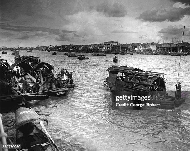 Canton, China: Scene on the Pearl River which is still strongly infested with pirates that manage to elude the numerous patrols by hiding in the...