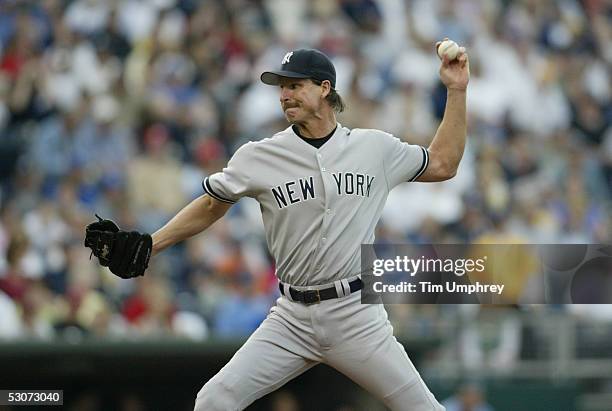 Pitcher Randy Johnson of the New York Yankees delivers a pitch against the Kansas City Royals during the game on June 1, 2005 at Kauffman Stadium in...