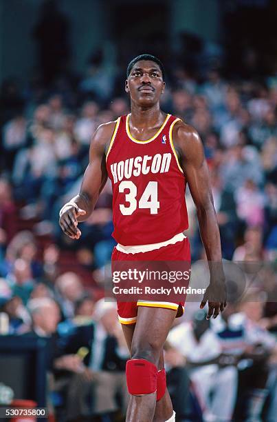 Hakeem Olajuwon of the Houston Rockets walks against the Sacramento Kings on March 4, 1987 at Arco Arena in Sacramento, California. NOTE TO USER:...