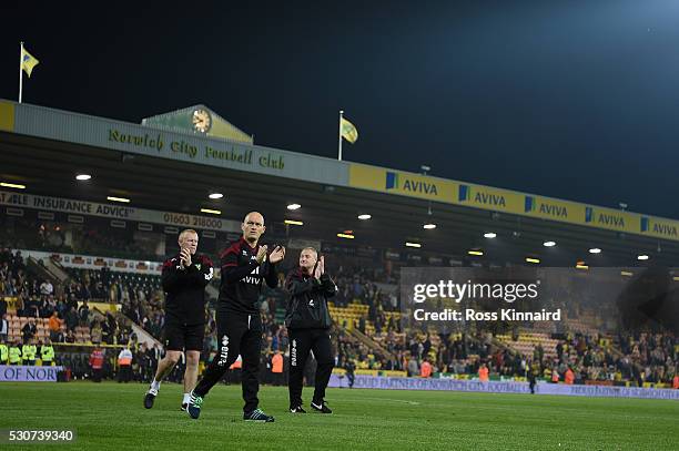Alex Neil, manager of Norwich City applauds the fans after his side were relegated during the Barclays Premier League match between Norwich City and...
