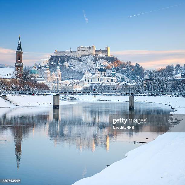 salzburg covered in snow, austria - salzburgerland stockfoto's en -beelden