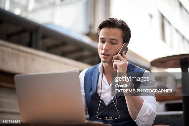 Man Using Computer Without Wi Fi Man Using Computer In Public Place High-Res Stock Photo - Getty Images