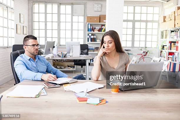 colleagues having problems at work - emergency plan binder stock pictures, royalty-free photos & images