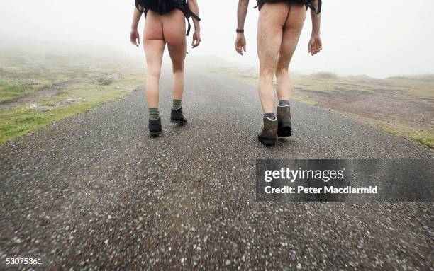 Naked ramblers Stephen Gough and Melanie Roberts set off on their walk to John O'Groats on June 16, 2005 at Land's End, England. Former Royal Marine,...