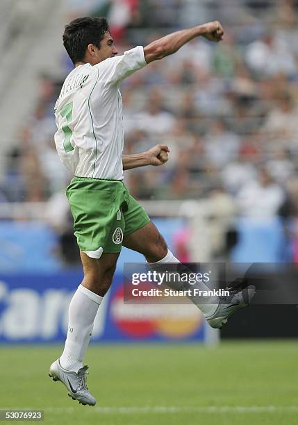 Zinha of Mexico celebrates scoring his goal during the FIFA Confederations Cup Match between Japan and Mexico at the AWD Arena on June 16, 2005 in...