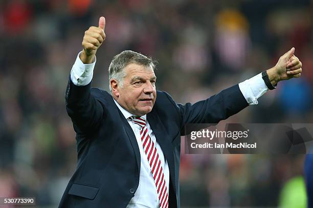 Sam Allardyce, manager of Sunderland celebrates staying in the Premier League after victory during the Barclays Premier League match between...