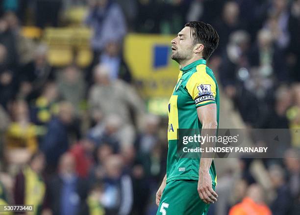 Norwich City's Scottish defender Russell Martin reacts on the final whistle in the English Premier League football match between Norwich City and...