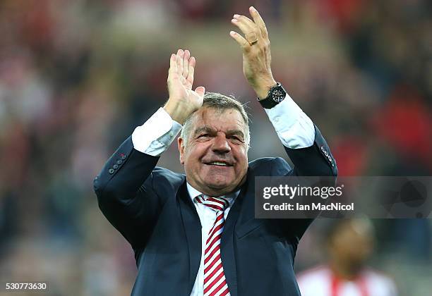 Sam Allardyce, manager of Sunderland celebrates staying in the Premier League after victory during the Barclays Premier League match between...