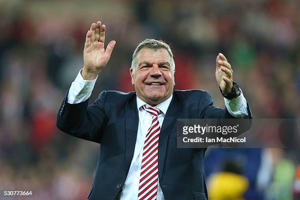 Sam Allardyce, manager of Sunderland celebrates staying in the Premier League after victory during the Barclays Premier League match between...