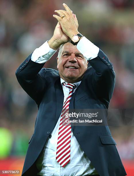 Sam Allardyce, manager of Sunderland celebrates staying in the Premier League after victory during the Barclays Premier League match between...