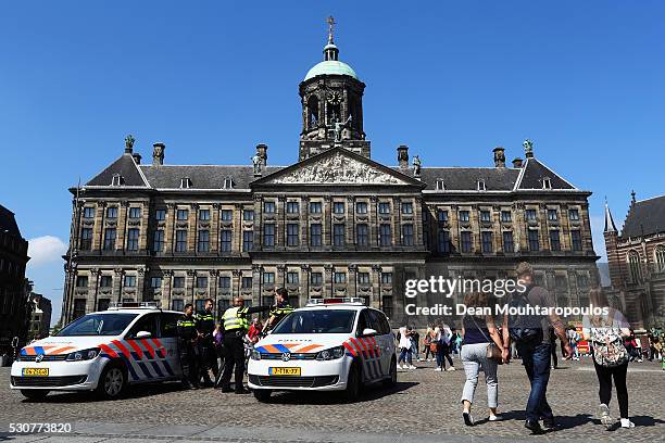 General view as Police guard the tourists and the Royal Palace on May 11, 2016 in Amsterdam, Netherlands. The Royal Palace or Koninklijk Paleis...