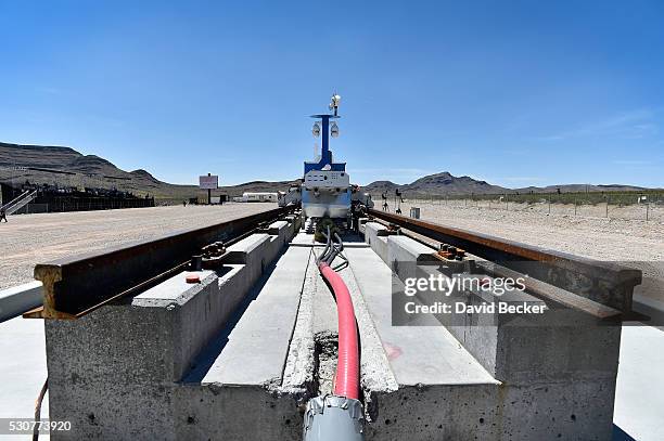 Recovery vehicle and a test sled sit on rails after the first test of the propulsion system at the Hyperloop One Test and Safety site on May 11, 2016...
