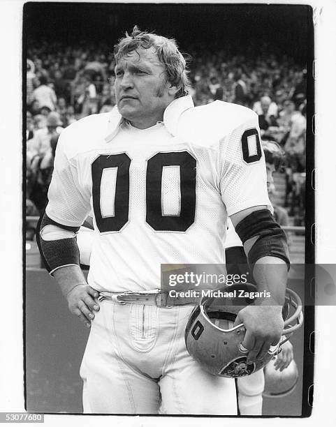 Jim Otto of the Oakland Raiders looks on from the sideline during the game against the San Francisco 49ers at Candlestick Park on October 27, 1974 in...