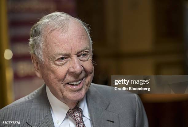 Boone Pickens, chairman and chief executive officer at BP Capital, smiles during a Bloomberg Television interview during the Skybridge Alternatives...