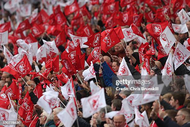 Middlesbrough fans wave flags during the Sky Bet Championship match between Middlesbrough and Brighton and Hove Albion at the Riverside Stadium on...