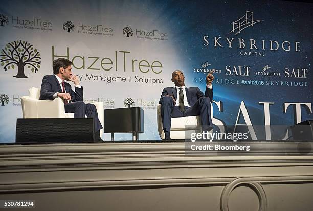 Kobe Bryant, former National Basketball Association player and chief executive officer of Kobe Inc., right, speaks during the Skybridge Alternatives...