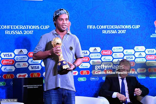 Ronaldinho holds the Confederations Cup Trophy to promote the FIFA Confederations Cup 2017 in Russia at the High Performance Centre ahead of the 66th...