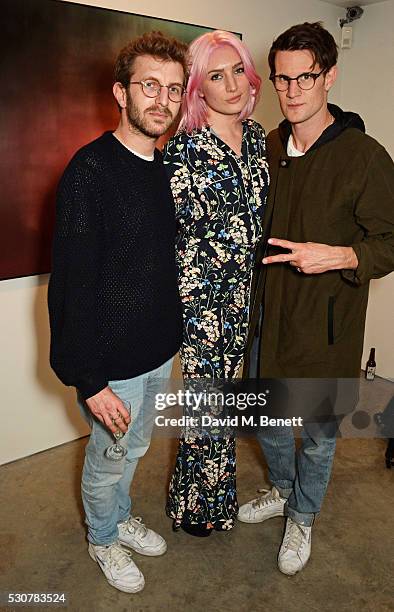 Hayden Kays, Victoria Williams and Matt Smith attend a private view of 'Photographs Of Films' by artist Jason Shulman at The Cob Gallery on May 11,...