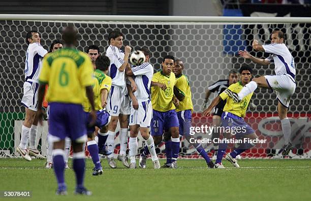 Juninho Pernambucano scores the third goal during the FIFA Confederations Cup 2005 Match between Brazil and Greece on June 16, 2005 in Leipzig,...