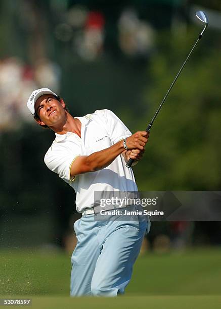 Adam Scott of Australia watches his pitch shot on the 18th hole during round one of the U.S. Open June 16, 2005 at Pinehurst Resort in Pinehurst,...