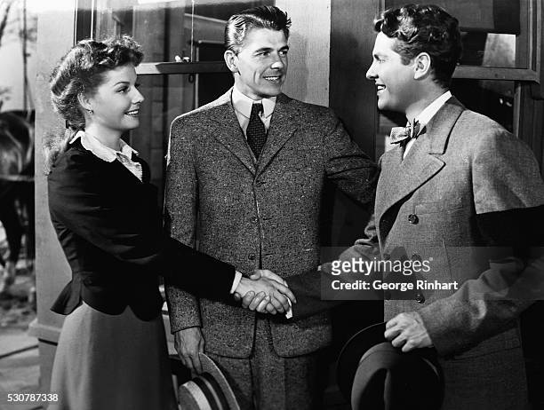 Scene from Warner Brother's film "King's Row," 1941, directed by Sam Wood, shows Ronald Reagan, Ann Sheridan and Robert Cummings . Ca. 1940s.