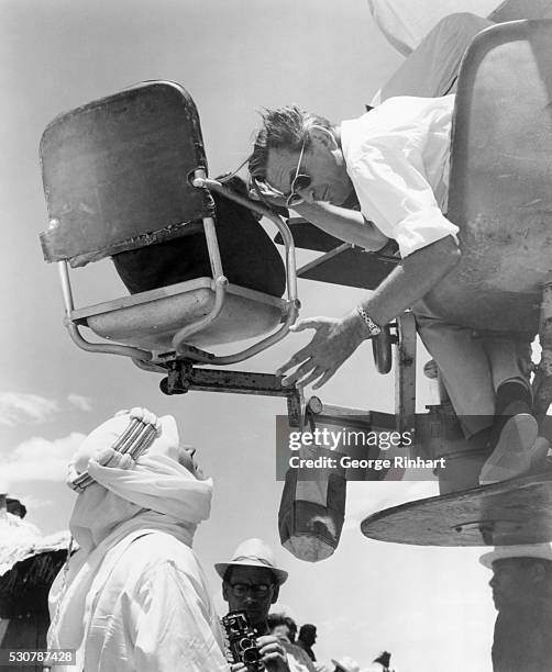 Peter O'Toole, star of "Lawrence of Arabia" is here seen during the making of the film, discussing a scene with director David Lean. The film was...