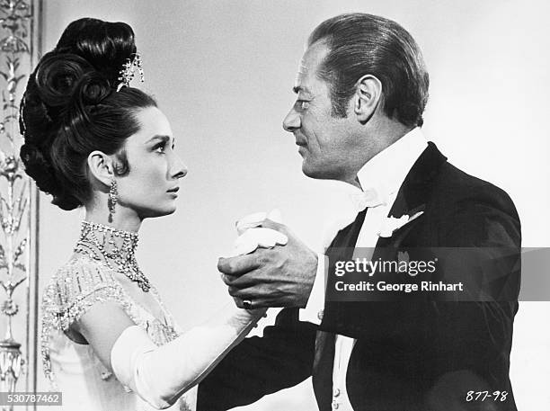 Rex Harrison as Professor Higgins and Audrey Hepburn as Eliza in the film-version of the Alan Jay Lerhner/Frederick Lowe stage-hit "My Fair Lady",...