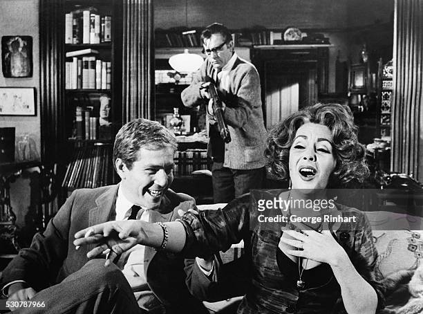 Elizabeth Taylor, Richard Burton and George Segal are shown in a scene from Edward Albee's "Who's Afraid of Virginia Woolf?", an Ernest Lehman...