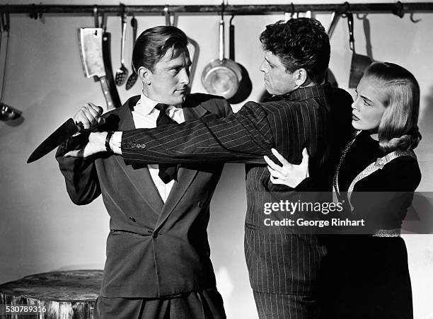 Kirk Douglas, Burt Lancaster and Lizabeth Scott is a scene from the Paramount Picture I Walk Alone. Directed by Byron Haskin.
