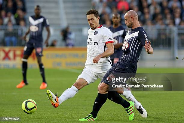 Benjamin Stambouli of Paris Saint Germain and Nicolas Pallois of Girondins de Bordeaux battle for the ball during the French Ligue 1 match between FC...