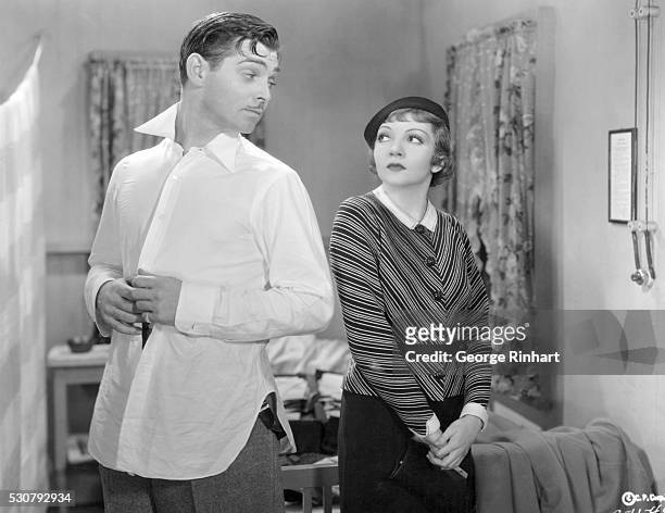 Actor Clark Gable and actress Claudette Colbert in a scene from Columbia Pictures' 1934 film It Happened One Night, directed by Frank Capra.