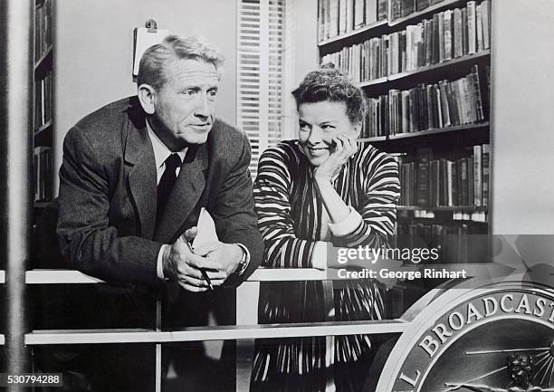 Spencer Tracy as Richard Sumner and Katharine Hepburn as Bunny Watson in the 1957 film, Desk Set .