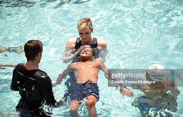 Founder, Princess Charlene of Monaco Foundation, Princess Charlene of Monaco teaches children how to swim and practice water safety at The Princess...